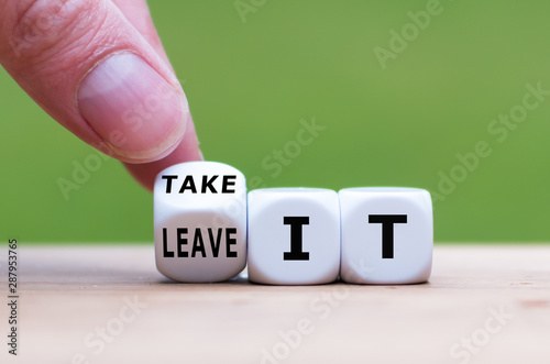 Hand turns a dice and changes the expression "leave it" to "take it", or vice versa.