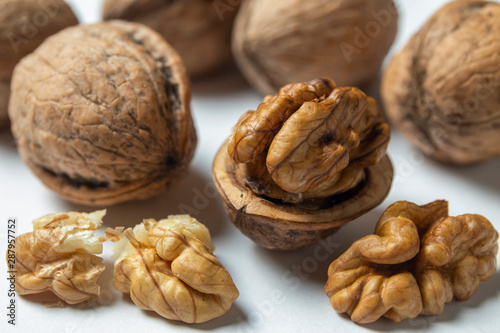 Group of walnuts and peeled walnuts 