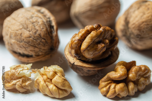 Group of walnuts and peeled walnuts 