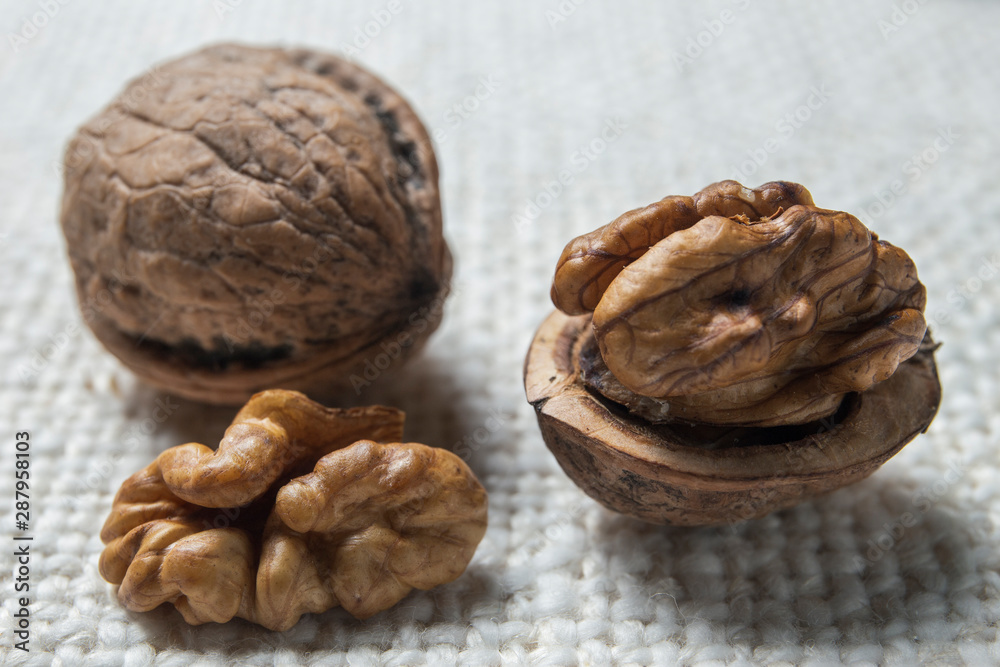 Walnuts on the burlap texture Walnuts on the burlap texture