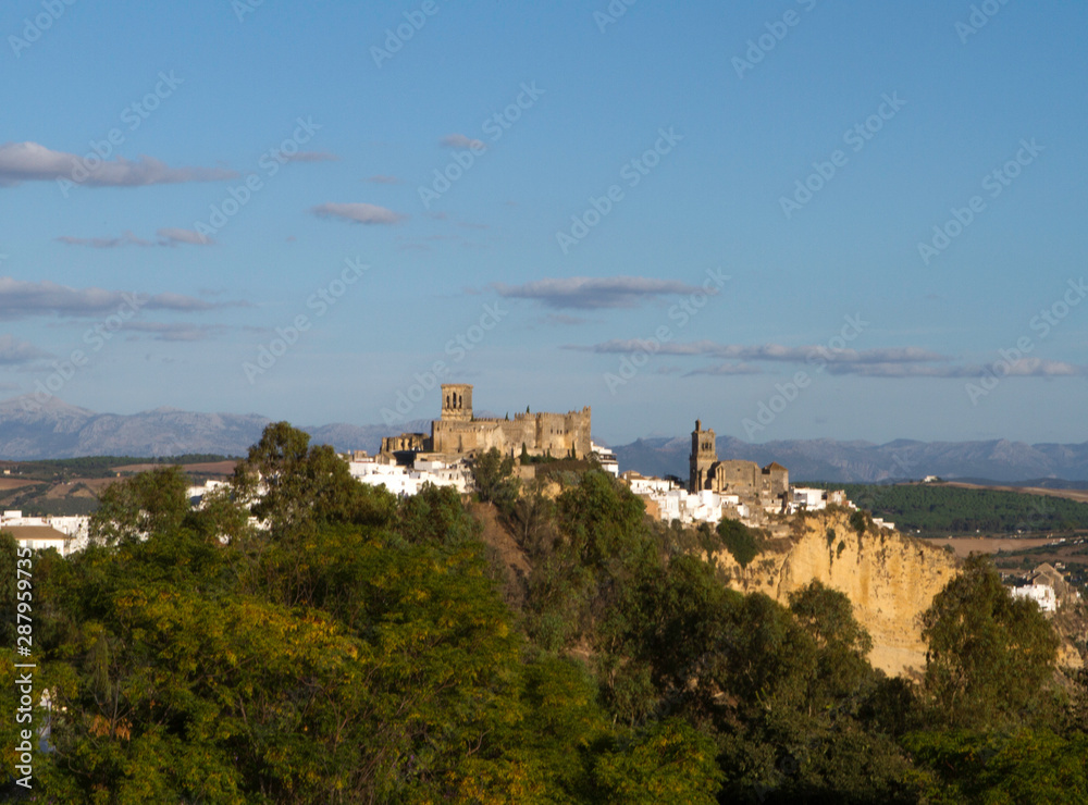 Panoramic view of Arcos de la Frontera, Andalucia. Arcos Skyline with Sierra de Cadiz in the background.