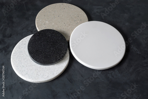 Round coasters made of artificial stone tabletop. Food stand.