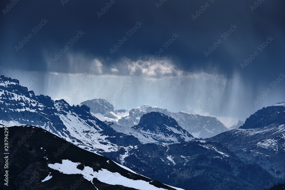 Rocks and mountains in South Tirol Italy with heavy weather