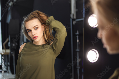 reflection of girl in the mirror
