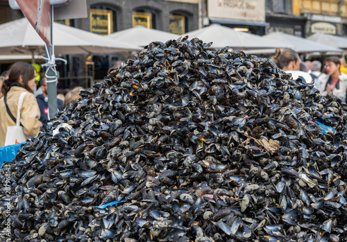 Great Lille Braderie (Braderie de Lille).Large pile of shells from eaten mussels, traditionally built on Great Lille Braderie. photo