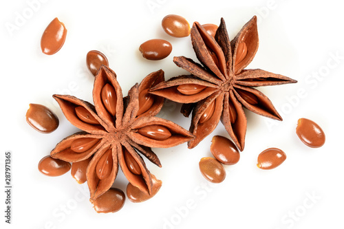 Star anise. Two star anise fruits with many seeds. Macro close up Isolated on white square background with shadow, top view of chinese badiane spice or Illicium verum.