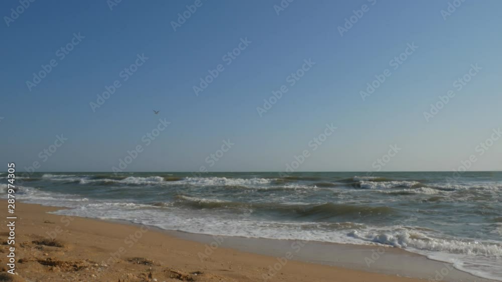 ocean or sea waves crashing on the shore. ocean or sea waves crashing on the shore.