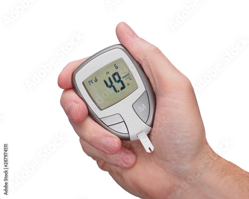 Handheld blood sugar monitor iIsolated on white.
