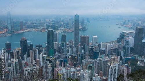 Time-lapse night to day Hong Kong City skyline day time view from Victoria Peak : PL, Panning Left, Panning.