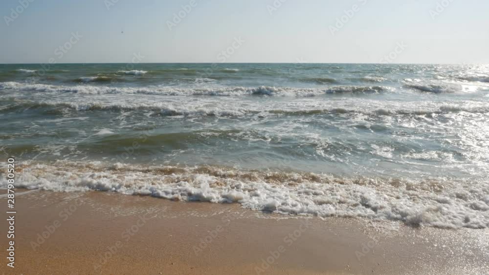 ocean or sea waves crashing on the shore. ocean or sea waves crashing on the shore.