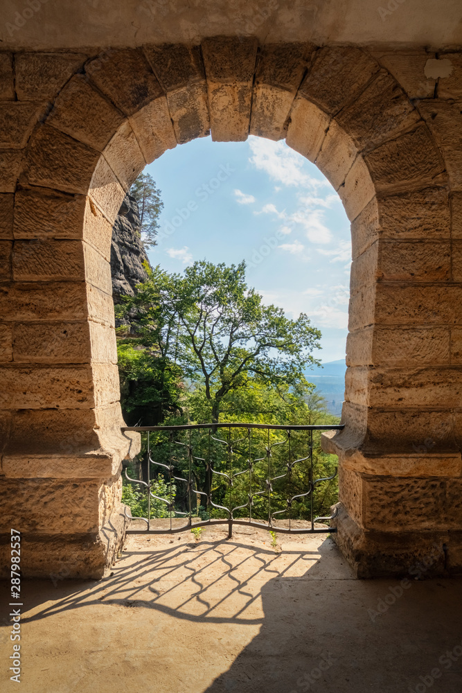 Arc gate view to the nature at Pravcicka brana, Czechia