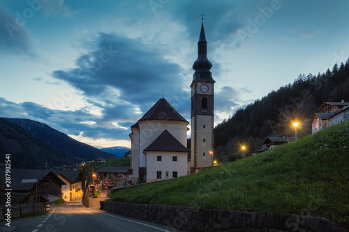 St. Peter church in San Pietro at night. Dolomites, Italy.