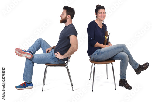 couple sitting in a vintage chair isolated on white