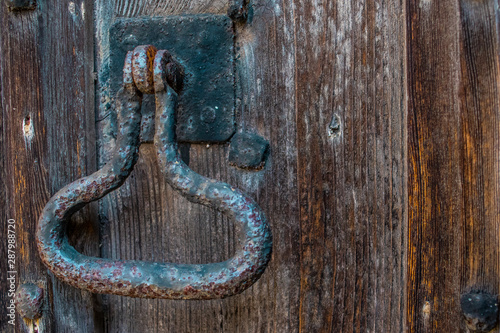 rusty old brown door knocker