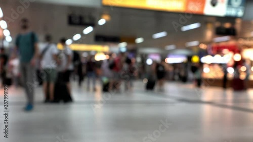 Wallpaper Mural Unidentified passengers with things in large European train station. 4K. Blurred view Torontodigital.ca