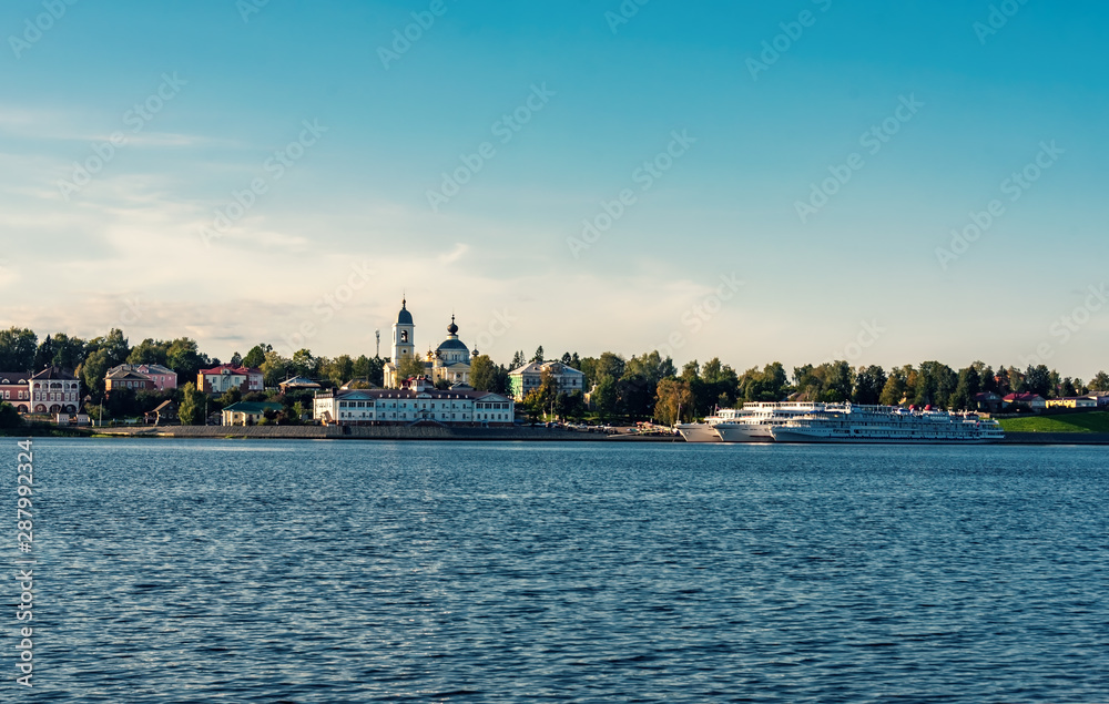 View of the city Myshkin from the Volga river at sunset