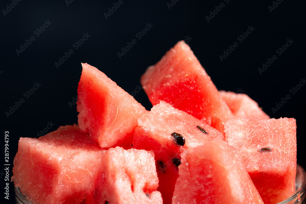 pieces of watermelon on glass bowl