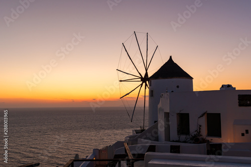 old windmill at sunset