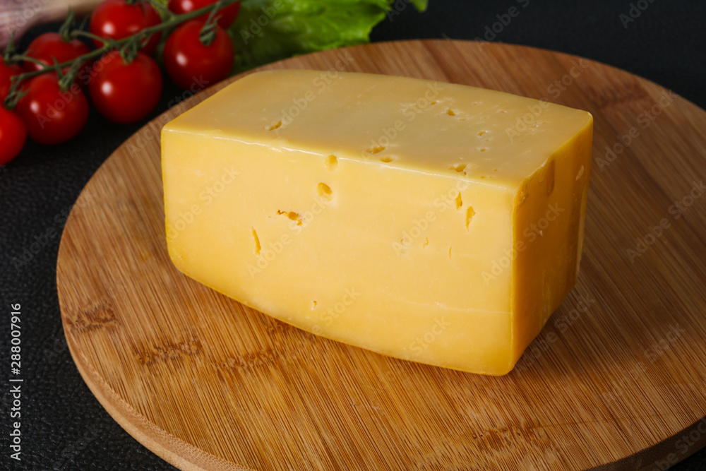 Hard yellow tasty cheese brick Hard yellow tasty cheese brick