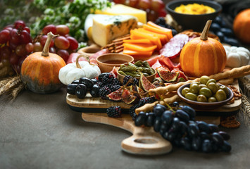 Fall party dinner table with charcuterie board