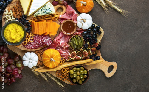 Fall party charcuterie board culinary background, view from above