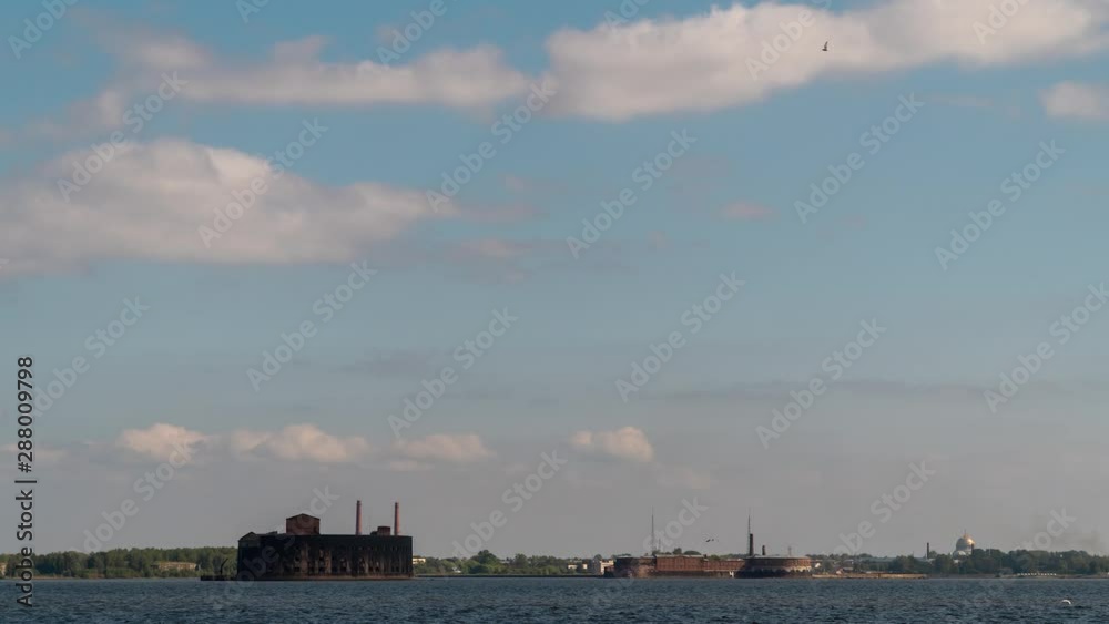 Russia. Saint-Petersburg. Timelapse. Steamers quickly sail on the Gulf of Finland against the FORTS of Kronstadt. Russia. Saint-Petersburg. Timelapse. Steamers quickly sail on the Gulf of Finland against the FORTS of Kronstadt.