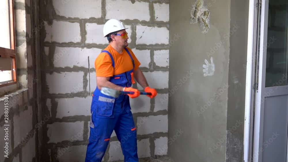 The worker is looking at the drawing, after the inspection is very unhappy The worker is looking at the drawing, after the inspection is very unhappy