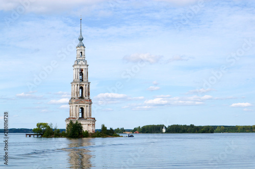Scenic landscape with famous russian landmark flooded belfry in Kalyazin, Volga river in bright summer day
