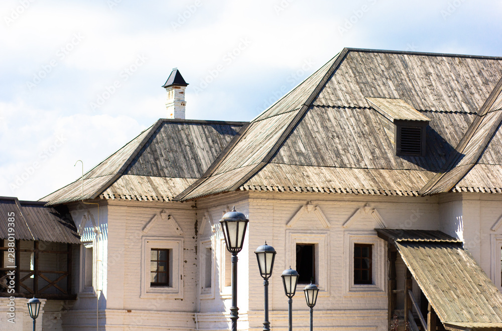 White walls of the fortress with a wooden roof of the uspensky monastery in Sviyazhsk
