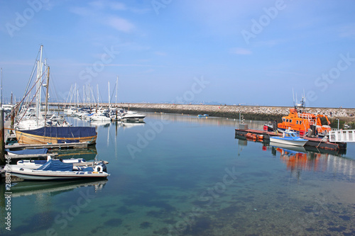 Lifeboat and yachts in Brixham Harbour, Devon