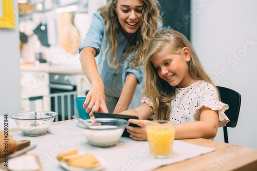 enjoying family breakfast time at home