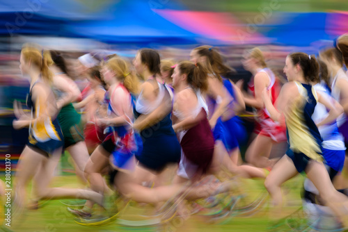 THETFORD CENTER, VT, USA - OCTOBER 4, 2014: The start of the 24th annual Thetford Academy Woods Trail Run, one of the girls high school division.