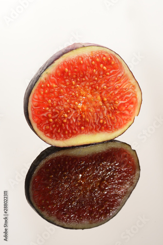 cut figs on a white background