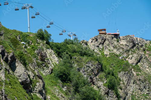 The top of the rocky mountain with the cable car. Krasnaya Polyana, Sochi, Russia. Ski resort at summer.