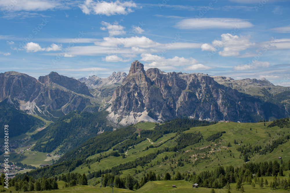Sassongher with neighboring Mountains. Beautiful sunny Summer day in the Dolomites. Landscape of the Dolomites above Corvara