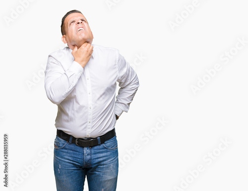 Middle age arab elegant man over isolated background Touching painful neck, sore throat for flu, clod and infection © Krakenimages.com