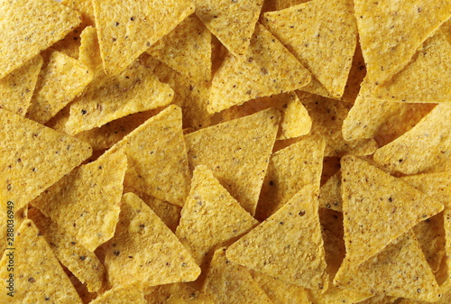 Tortilla chips background and texture, top view