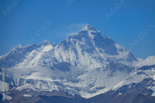 CLOSE UP: Spectacular shot of windswept summit of Mount Everest from Gawula Pass