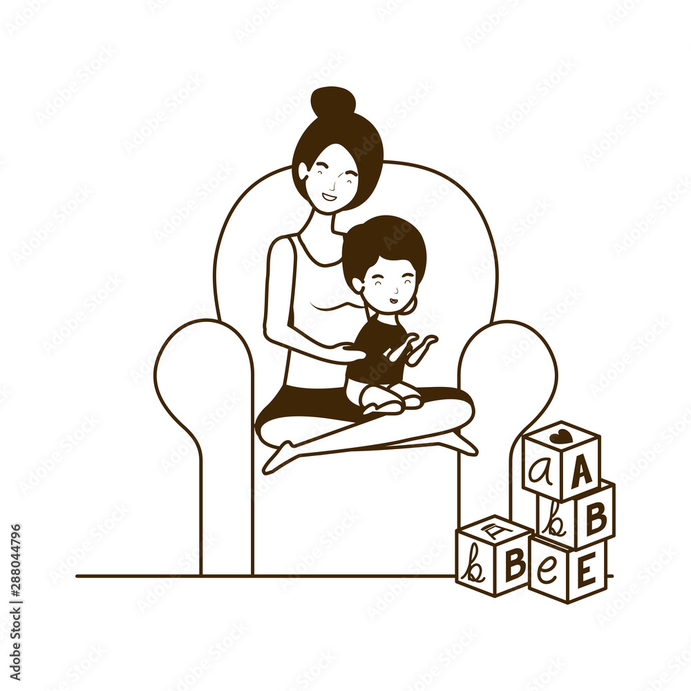 cute pregnancy mother with little boy seated in sofa
