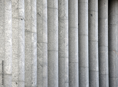 Gray columns in front of a building