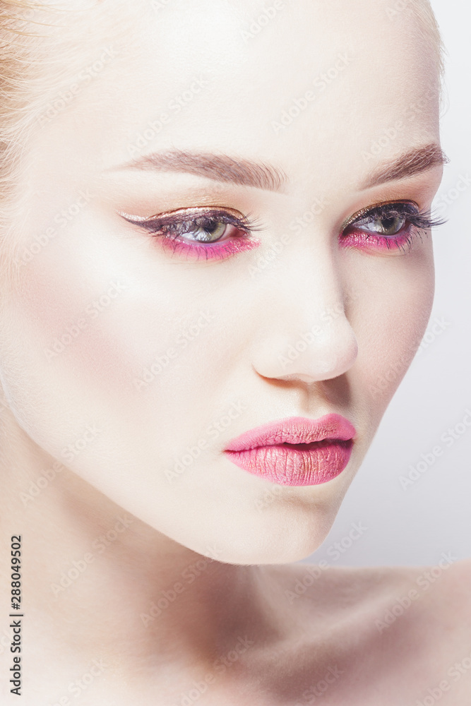 Portrait of beautiful woman with make up, studio shoot Portrait of beautiful woman with make up, studio shoot