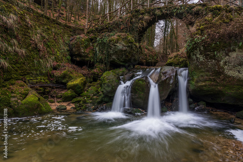 The Schiessentümpel is a small and picturesque waterfall on the Black Ernz river. Mullerthal - Luxembourg’s Little Switzerland.