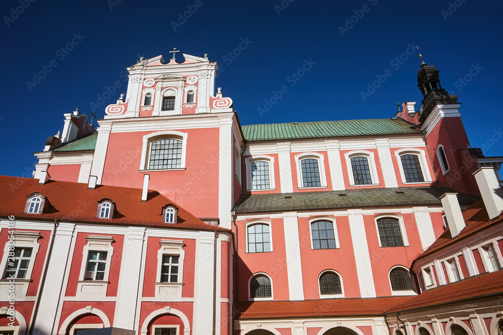 Baroque Catholic Church and a historic religious building in Poznan.