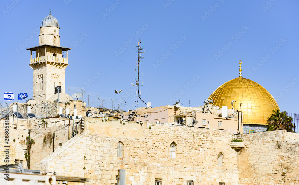 Stunning view of the of the Dome of the Rock (Al-Aqsa Mosque) during a sunny day. Al-Aqsa Mosque located in the Old City of Jerusalem, is the third holiest site in Islam. Jerusalem, Israel.