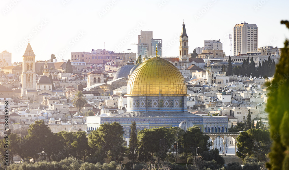 Fototapeta premium View from above, stunning view of the Jerusalem skyline with the beautiful Dome of the Rock (Al-Aqsa Mosque). Picture taken from the Mount of Olives adjacent to Jerusalem's Old City.