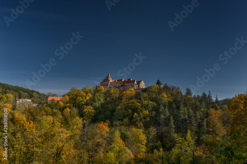 Landscape view on the gothic Castle Pernstejn during autumn time - Czech Republic