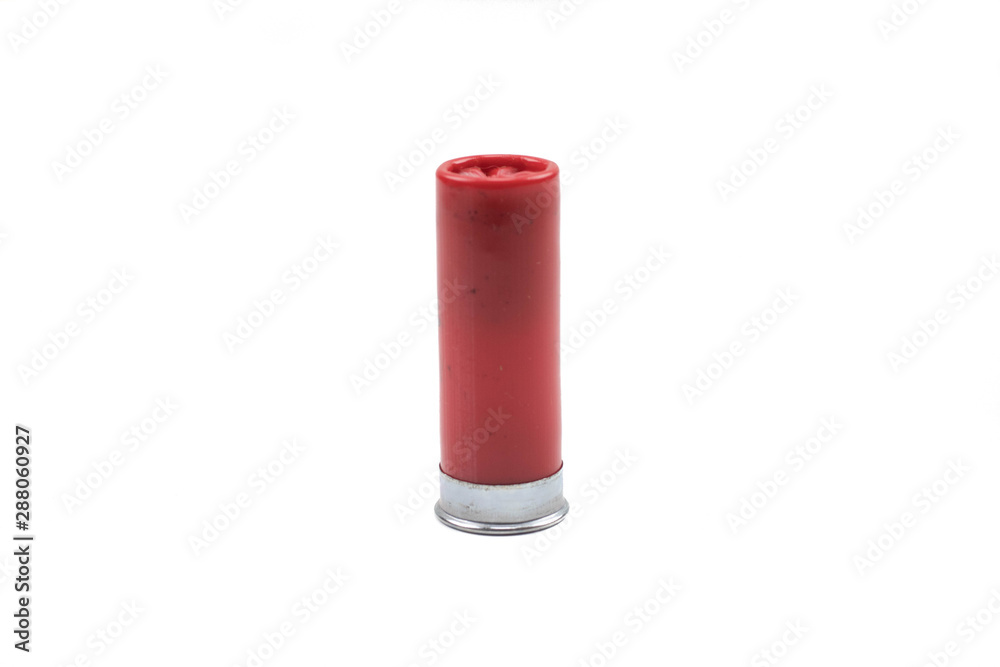 A close up image of a red shotgun shells, shot close up in macro, isolated on a clean, white background
