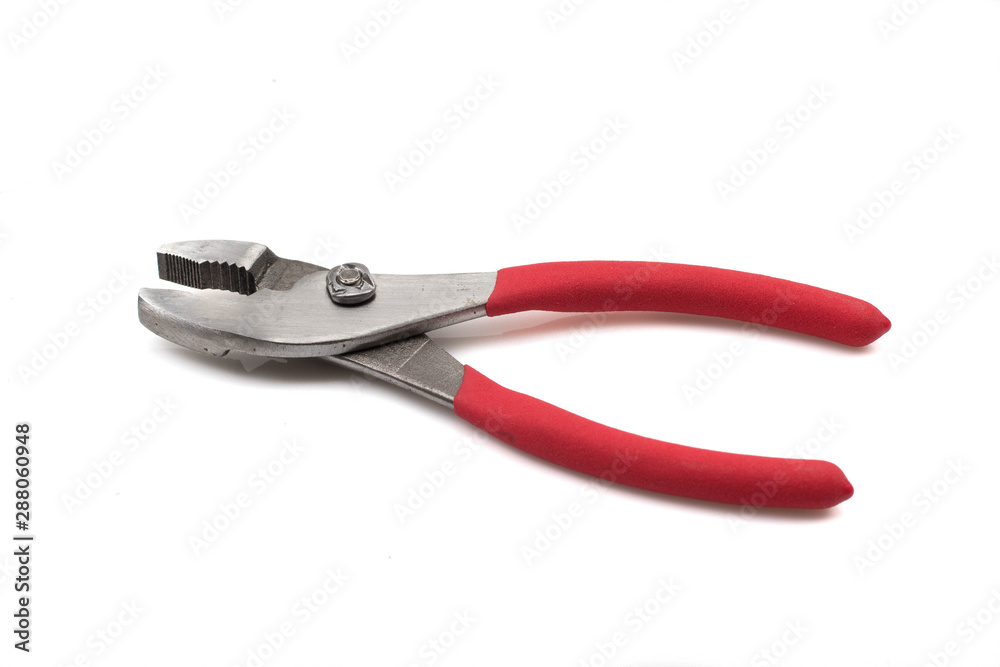 A close up image of a pair of red handled pliers isolated on a white background A close up image of a pair of red handled pliers isolated on a white background