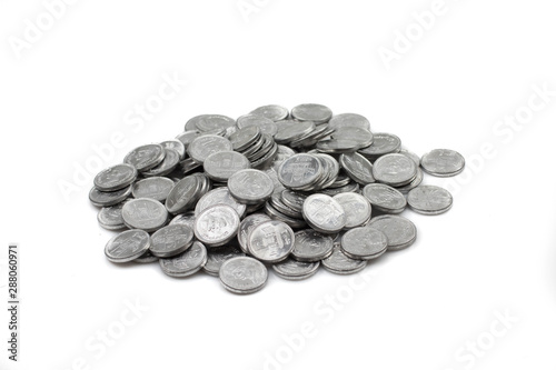 A close up image of a pile of Pakistani rupees isolated on a clean  white background