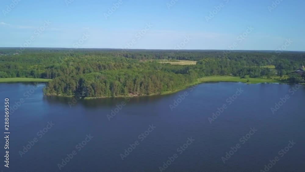 Aerial pan of the lake near Sparreholm in Sweden Aerial pan of the lake near Sparreholm in Sweden